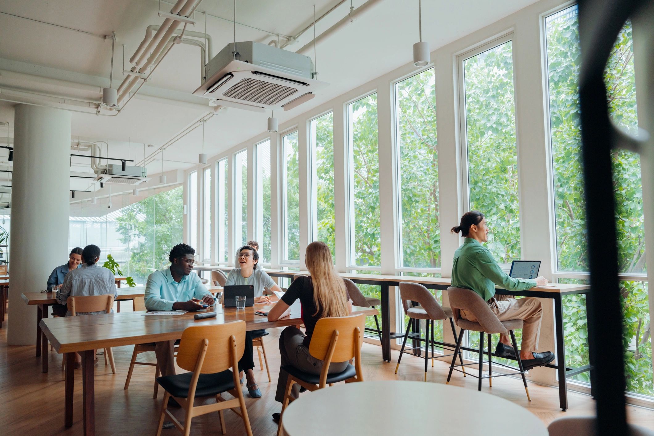 Consulting professionals collaborating in a bright office